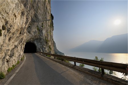 road landscape water - Tunnel through Mountain by Lago di Garda, Lombardy, Italy Stock Photo - Rights-Managed, Code: 700-03018034