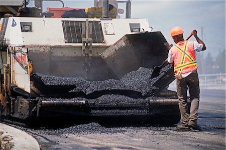 Worker Shovelling Asphalt for Road Paving, Calgary, Alberta, Canada Stock Photo - Rights-Managed, Code: 700-03053774