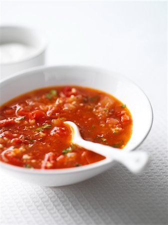Baharat Tomato Soup With Couscous and Fresh Herbs Foto de stock - Con derechos protegidos, Código: 700-03053781