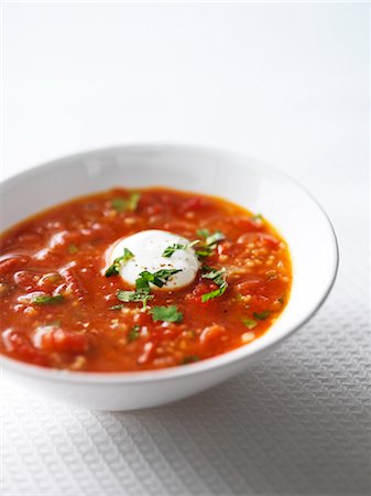 spices white - Baharat Tomato Soup With Couscous and Fresh Herbs Stock Photo - Rights-Managed, Code: 700-03053782