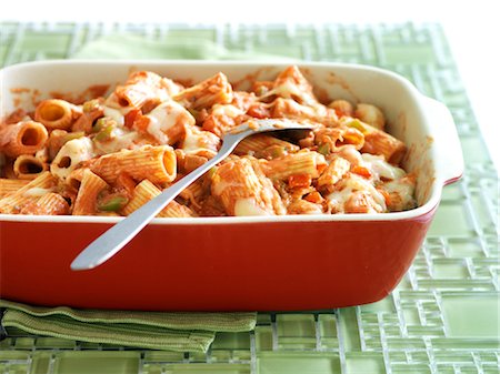 rigatoni pasta dish with tomato sauce - Baked Rigatoni With Marinara Sauce, Cream of Mushroom Soup, Mozzarella and Parmesan Stock Photo - Rights-Managed, Code: 700-03053783