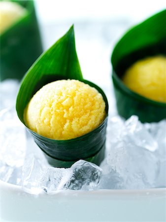 sherbet - Pineapple, Mango Banana Sorbet Wrapped in a Banana Leaf Stock Photo - Rights-Managed, Code: 700-03053820