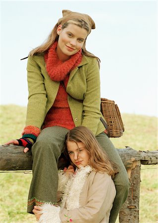 family outdoors candid - Mother and Daughter by Fence Stock Photo - Rights-Managed, Code: 700-03067834