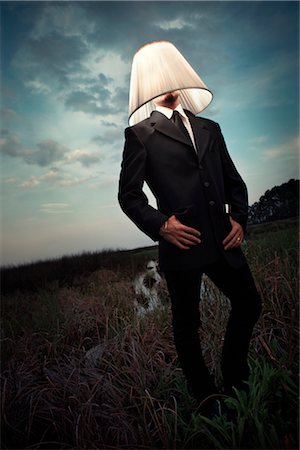 surrealism - Businessman Wearing Lampshade Stock Photo - Rights-Managed, Code: 700-03075208