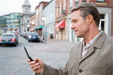 Man Using Cell Phone Stock Photo - Rights-Managed, Code: 700-03075251