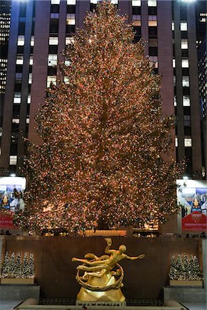 simsearch:700-03622862,k - Christmas Tree Lit Up at Rockefeller Center, New York City, New York, USA Stock Photo - Rights-Managed, Code: 700-03075613
