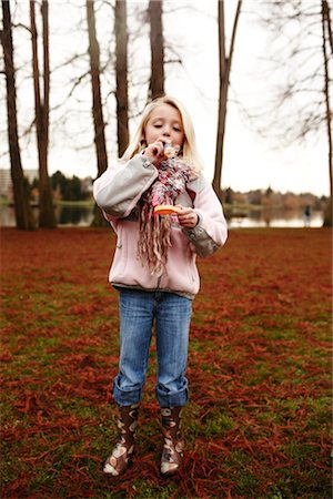 Girl Blowing Bubbles Stock Photo - Rights-Managed, Code: 700-03075857