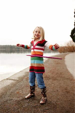 Girl Hula-hooping Stock Photo - Rights-Managed, Code: 700-03075865