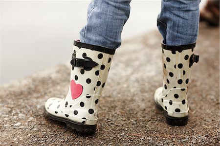 someone standing on a dot - Girl's Rubber Boots Stock Photo - Rights-Managed, Code: 700-03075872