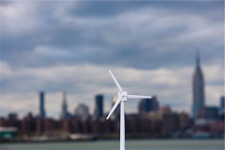 energy turbines - Model Wind Turbine With City in the Background Stock Photo - Rights-Managed, Code: 700-03152547