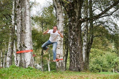 simsearch:700-03179164,k - Man Slacklining Stock Photo - Rights-Managed, Code: 700-03161674