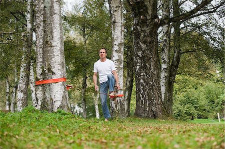 simsearch:700-03179177,k - Man Slacklining Stock Photo - Rights-Managed, Code: 700-03161672