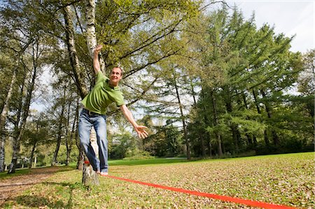 simsearch:700-03179177,k - Man Slacklining Stock Photo - Rights-Managed, Code: 700-03161685