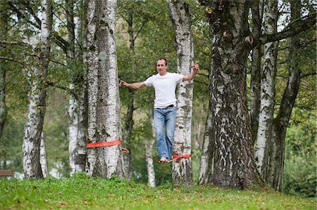 simsearch:700-03179164,k - Man Slacklining Stock Photo - Rights-Managed, Code: 700-03161692