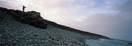 panoramic beach - Woman on Beach Taking Picture of the Sea, Ireland Stock Photo - Rights-Managed, Code: 700-03178405