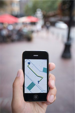 Person Holding GPS Device Foto de stock - Con derechos protegidos, Código: 700-03178533