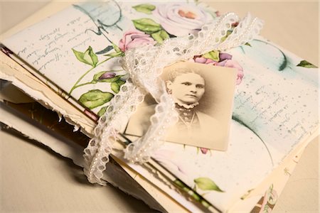 Black and White Photograph and Stack of Old Letters Stock Photo - Rights-Managed, Code: 700-03178984