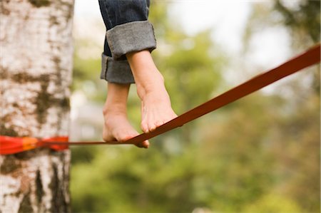 ropa casual - Woman on Slackline Stock Photo - Rights-Managed, Code: 700-03179164