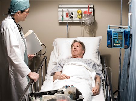 patients in hospital bed serious - Emergency Doctor with Patient Stock Photo - Rights-Managed, Code: 700-03210508