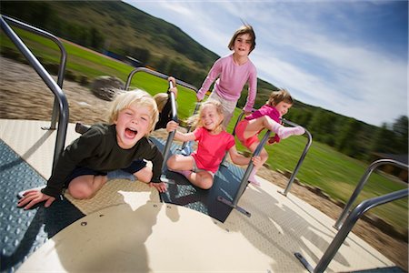 playground friends - Children on Merry-go-round Stock Photo - Rights-Managed, Code: 700-03210502