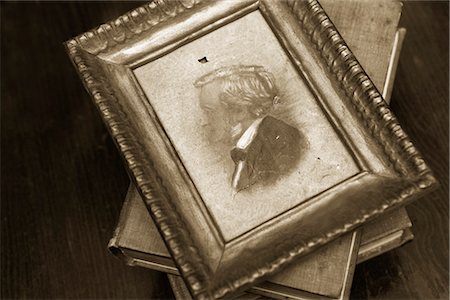 sepia - Still Life of Antique Framed Painting and Old Books Stock Photo - Rights-Managed, Code: 700-03227544