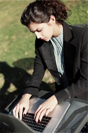 school jacket - Woman Using Laptop Stock Photo - Rights-Managed, Code: 700-03229317