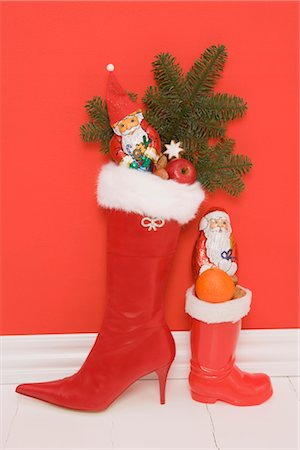 decoration footwear - Boots Stuffed with Presents Stock Photo - Rights-Managed, Code: 700-03229755
