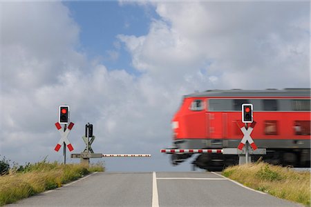 Railway Crossing, Sylt, Nord îles frisonnes, Nordfriesland, Schleswig-Holstein, Allemagne Photographie de stock - Rights-Managed, Code: 700-03229807