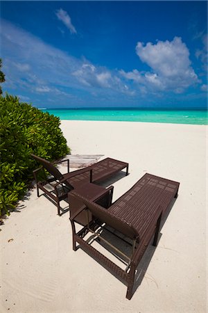 Sunloungers on Beach, Banyan Tree Madivaru, Alif Alif Atoll, Maldives Stock Photo - Rights-Managed, Code: 700-03244288