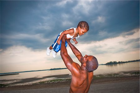 Père et fils jouent sur la plage Photographie de stock - Rights-Managed, Code: 700-03244352