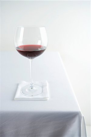 restaurant indoors nobody - Glass of Red Wine on Table Stock Photo - Rights-Managed, Code: 700-03265798