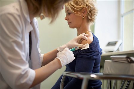 doctor examine woman only - Doctor and Patient Stock Photo - Rights-Managed, Code: 700-03284274