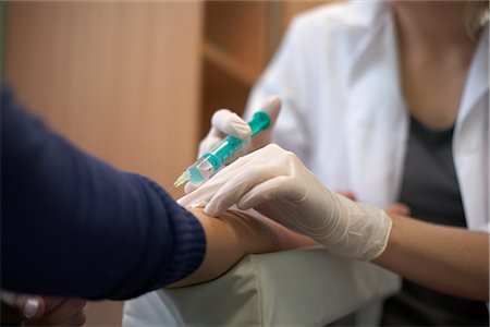 female latex gloves - Doctor and Patient Stock Photo - Rights-Managed, Code: 700-03284275