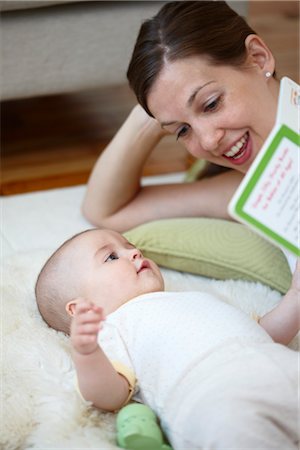 family lying on carpet - Mother Playing with Baby Stock Photo - Rights-Managed, Code: 700-03294891