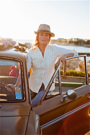 simsearch:862-07910972,k - Portrait of Woman With a Vintage Car, Santa Cruz, California, USA Stock Photo - Rights-Managed, Code: 700-03295056