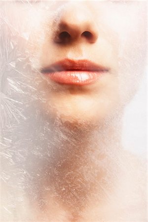 de las mujeres - Woman's Lips Behind Frozen Glass Foto de stock - Con derechos protegidos, Código: 700-03290046