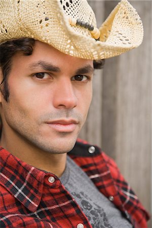 fashion casual clothing man young portrait not woman - Close-up Portrait of Man wearing Cowboy Hat Stock Photo - Rights-Managed, Code: 700-03290299