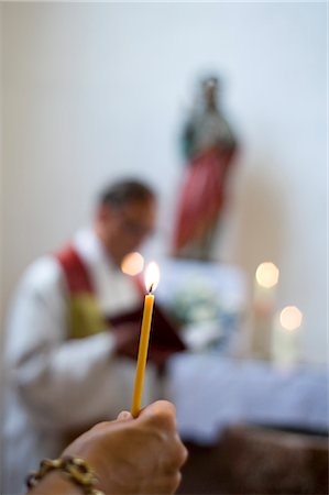 defocused light - Hand Holding Candle in Church Stock Photo - Rights-Managed, Code: 700-03333149