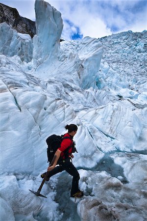 Femme héli-randonnée, Franz Josef Glacier, South Island, Nouvelle-Zélande Photographie de stock - Rights-Managed, Code: 700-03333674