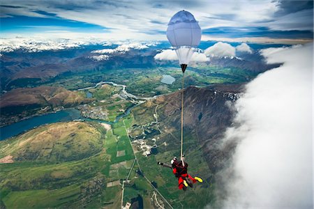 surélevé - Tandem parachutisme sur le Remarkables, Queenstown, île du Sud, Nouvelle-Zélande Photographie de stock - Rights-Managed, Code: 700-03333698