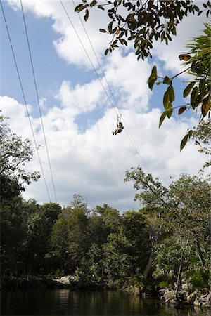 Person Zip Lining, Tulum, Mexico Foto de stock - Con derechos protegidos, Código: 700-03355679