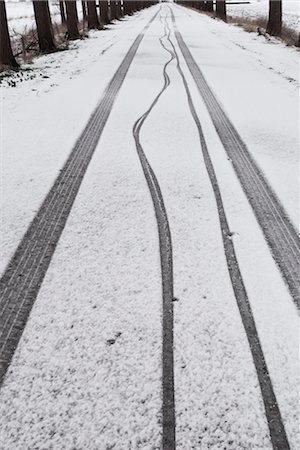 Tire Tracks on Snow Stock Photo - Rights-Managed, Code: 700-03361599