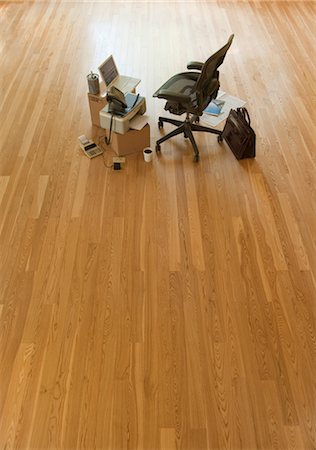 empty room with wooden floor - Chair and Cardboard Boxes in Empty Office Stock Photo - Rights-Managed, Code: 700-03361701