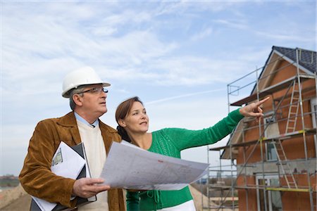 senior pointing - Architects at Home Construction Site Stock Photo - Rights-Managed, Code: 700-03404088