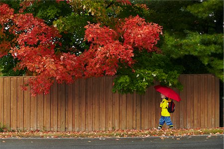 rommel and children - Boy Walking to School on Rainy Day Stock Photo - Rights-Managed, Code: 700-03406457