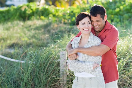 simsearch:700-03407270,k - Couple Embracing Outdoors Stock Photo - Rights-Managed, Code: 700-03407266