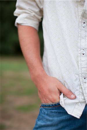 pollice - Close-up of Man with Hand in Pocket Fotografie stock - Rights-Managed, Codice: 700-03407795