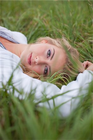 Teenager Lying in Grass Stock Photo - Rights-Managed, Code: 700-03407799