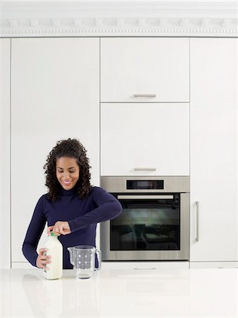 Woman Measuring Milk Stock Photo - Rights-Managed, Code: 700-03407949