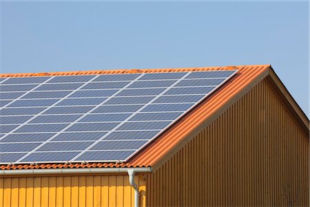 rooftop solar panel - Solar Panels on Roof Stock Photo - Rights-Managed, Code: 700-03407993